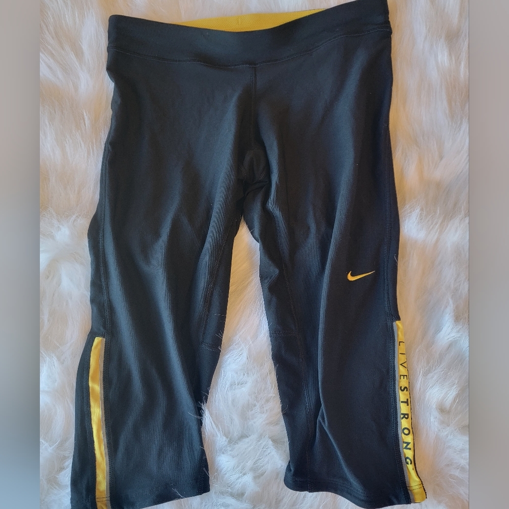 NIKE black and yellow livestrong medium capri pants